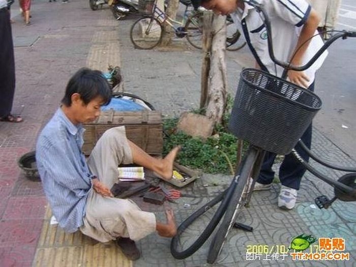 Безрукий парень из Китая (20 фото)