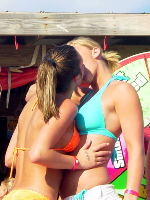 Girls in a bikini kissing